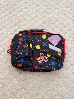 Planetbox Rover/Launch Carry Bag with stickers attached.
